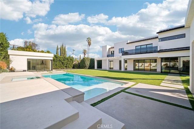 outdoor pool with a pergola, a lawn, and a patio