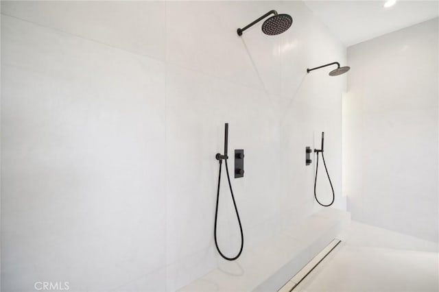 details with walk in shower and recessed lighting