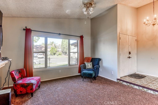 sitting room featuring a textured ceiling, vaulted ceiling, carpet floors, and ceiling fan with notable chandelier