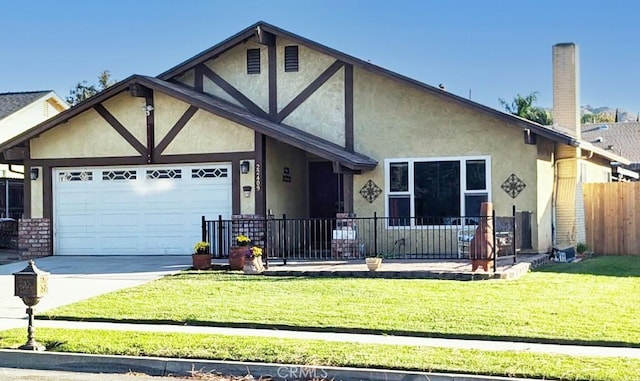 view of front facade featuring a front lawn and a garage