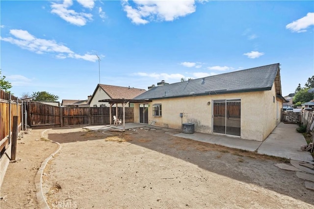 back of house featuring a patio and central AC unit