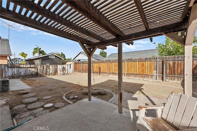 view of patio with cooling unit and a pergola