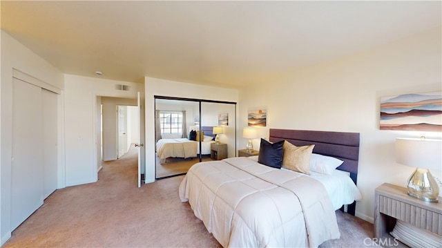 carpeted bedroom featuring a closet