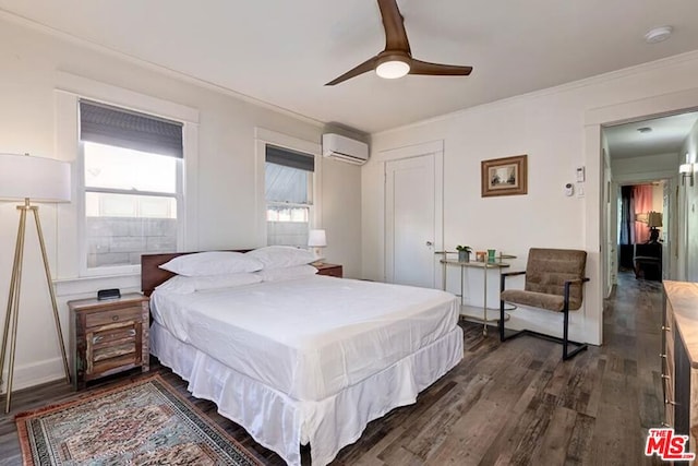 bedroom with ornamental molding, a wall unit AC, dark hardwood / wood-style floors, and ceiling fan