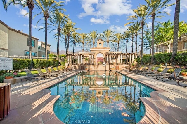 view of swimming pool featuring a patio area