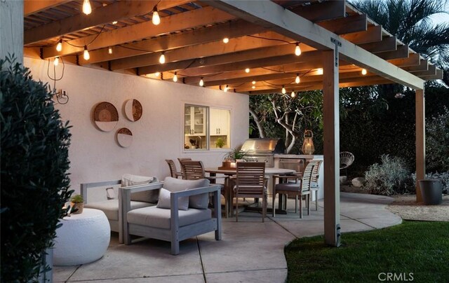 view of patio / terrace featuring area for grilling, grilling area, and a pergola