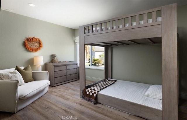 bedroom featuring light wood-type flooring