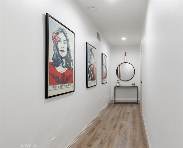 hallway featuring light hardwood / wood-style floors