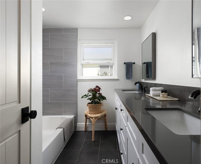 bathroom with vanity and tile patterned flooring