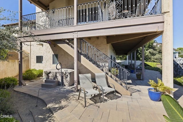 view of patio with a balcony