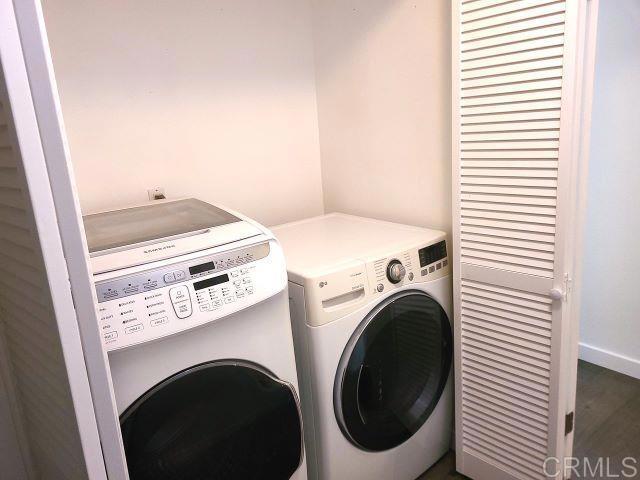 laundry room with washer and clothes dryer