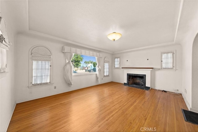 unfurnished living room featuring light hardwood / wood-style floors