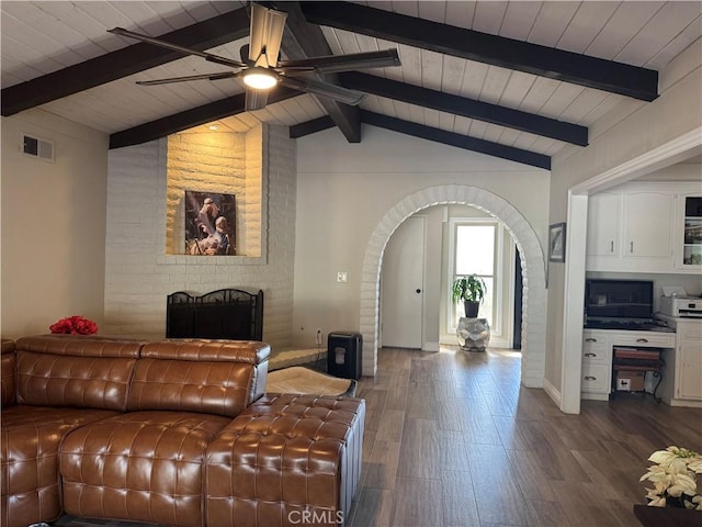 living room with ceiling fan, wood ceiling, lofted ceiling with beams, and hardwood / wood-style flooring