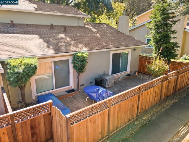 back of house featuring a patio