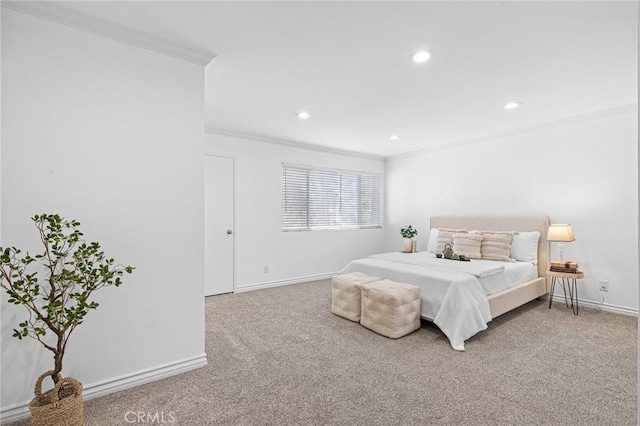 bedroom with crown molding and carpet floors