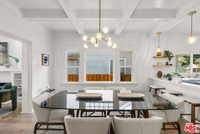 dining space with beamed ceiling, light hardwood / wood-style floors, a wealth of natural light, and a notable chandelier