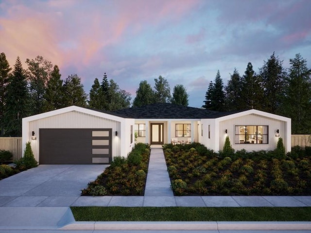 view of front of property with a garage