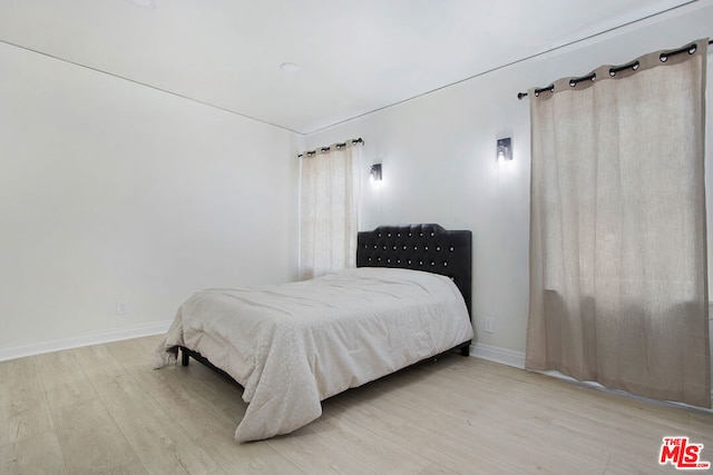 bedroom featuring light hardwood / wood-style floors