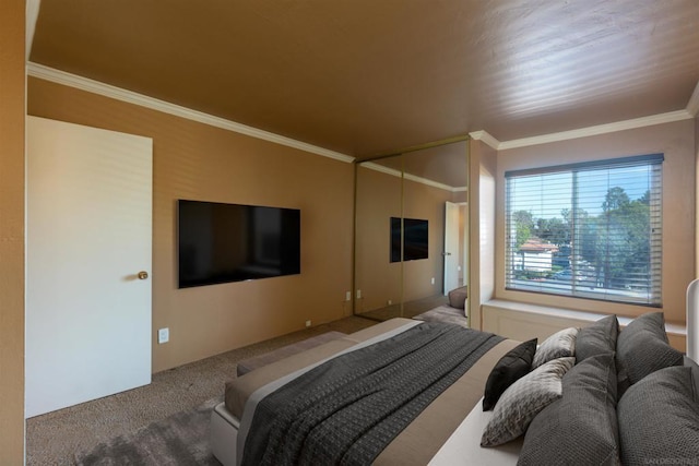 bedroom featuring carpet floors and crown molding