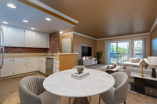 kitchen with white cabinetry, dishwasher, sink, crown molding, and decorative backsplash