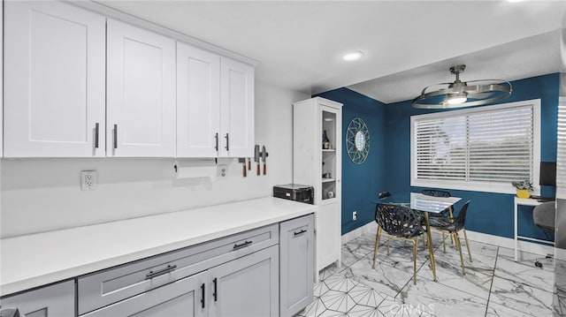 kitchen with white cabinets