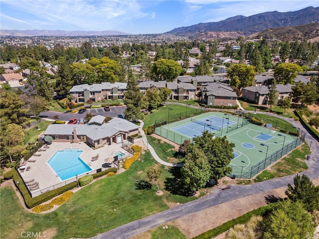 birds eye view of property featuring a mountain view