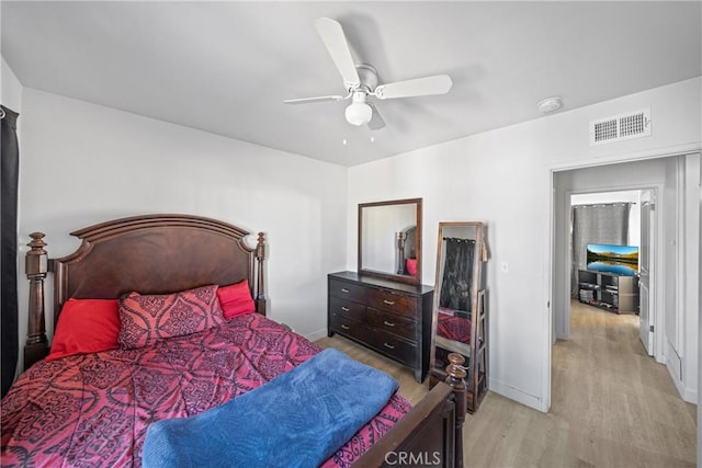 bedroom featuring ceiling fan and light hardwood / wood-style floors