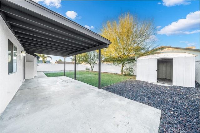 view of patio / terrace featuring a storage unit