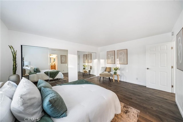 bedroom featuring dark hardwood / wood-style flooring