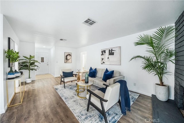 living room with dark wood-type flooring