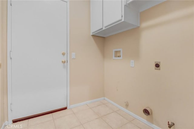 washroom featuring cabinets, electric dryer hookup, gas dryer hookup, and hookup for a washing machine