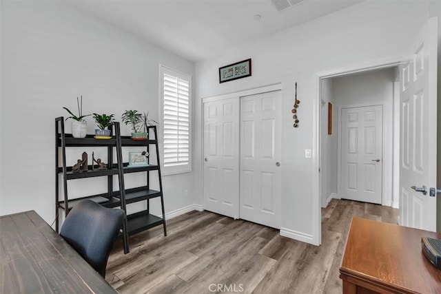 office area featuring hardwood / wood-style floors