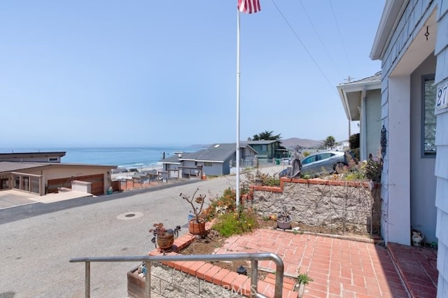 view of patio / terrace featuring a water view