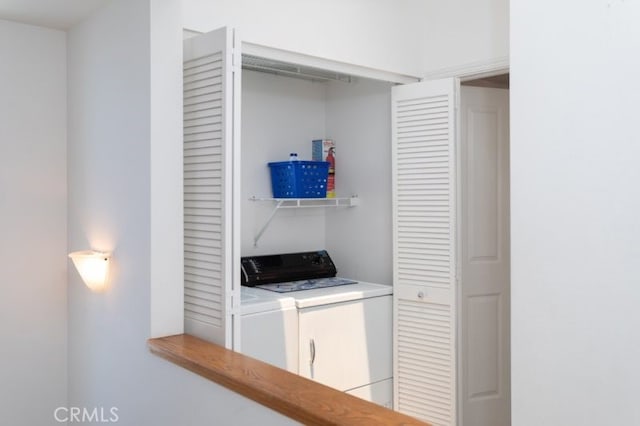 laundry room featuring washer and dryer