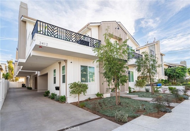 view of front of home with a balcony