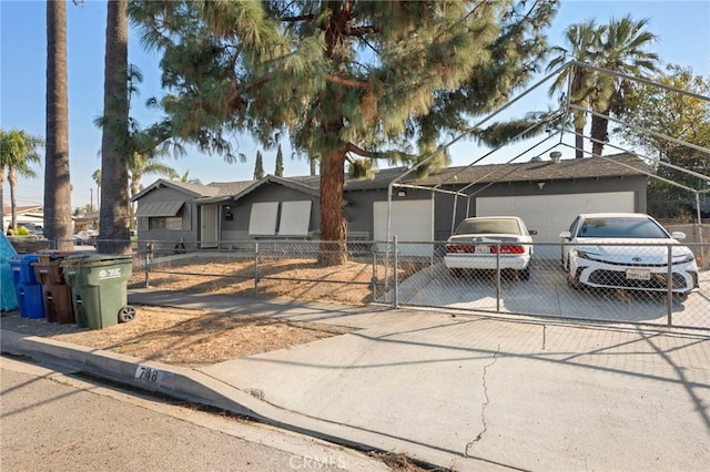 single story home with a garage