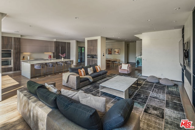 living room with wood-type flooring