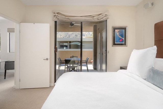 bedroom featuring light colored carpet