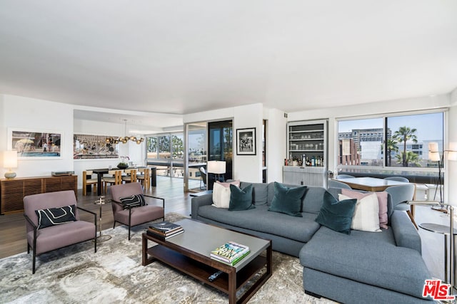 living room with hardwood / wood-style floors and a wealth of natural light