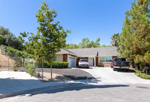 single story home with a garage