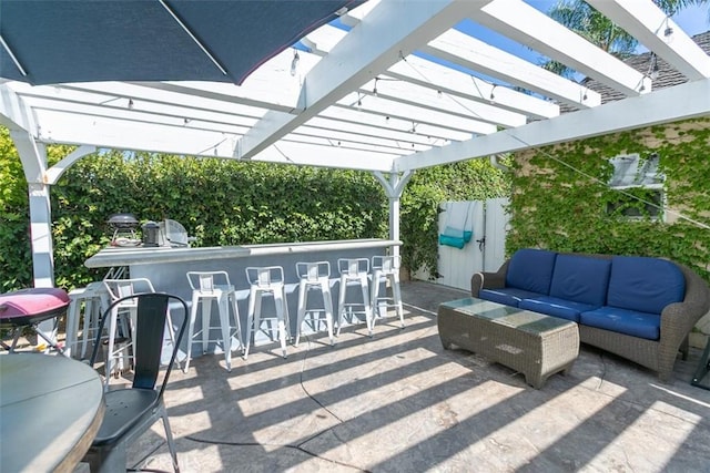 view of patio / terrace with a pergola, an outdoor living space, and exterior bar