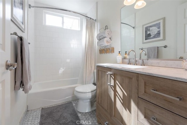 full bathroom featuring tile patterned flooring, vanity, shower / bath combo, and toilet