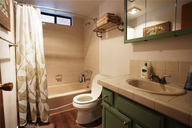 full bathroom featuring hardwood / wood-style floors, shower / bathtub combination with curtain, vanity, decorative backsplash, and toilet