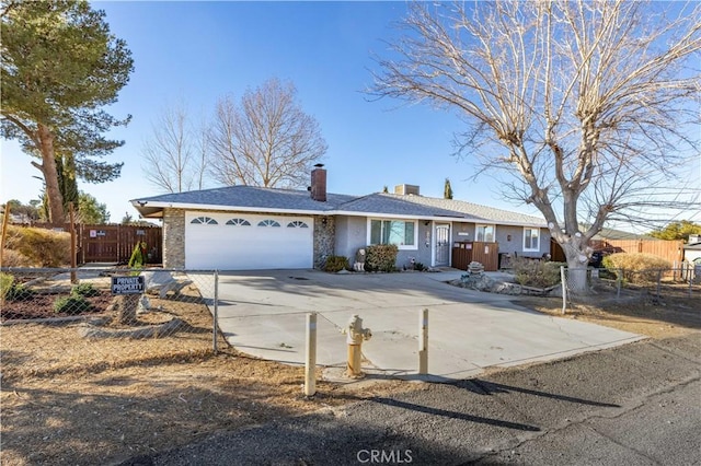 ranch-style home with a garage