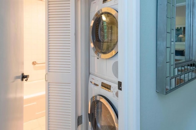 washroom with stacked washer / dryer