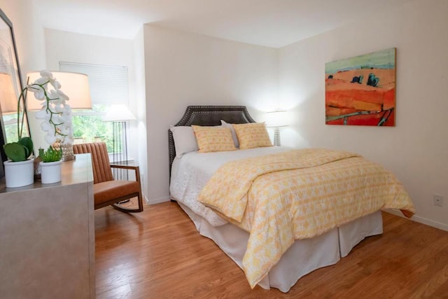 bedroom featuring hardwood / wood-style floors