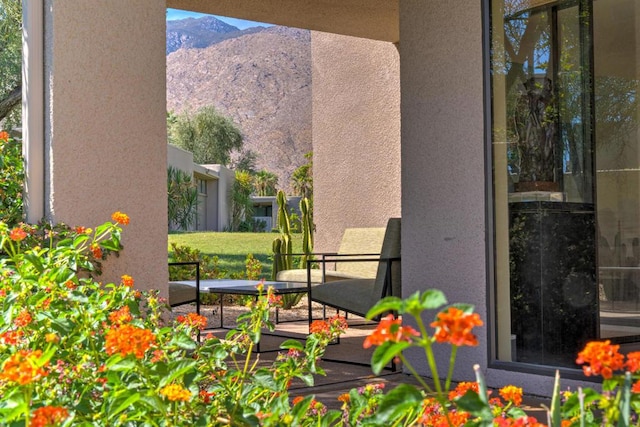 view of patio / terrace with a mountain view