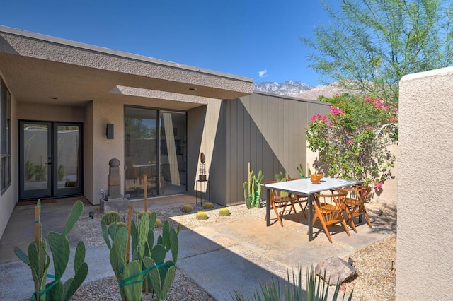 view of patio featuring french doors