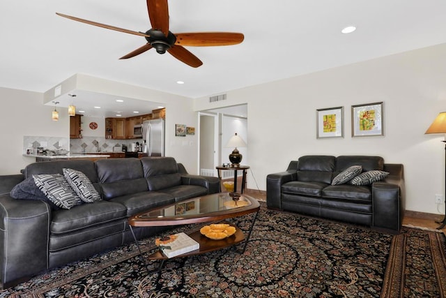 living room with ceiling fan