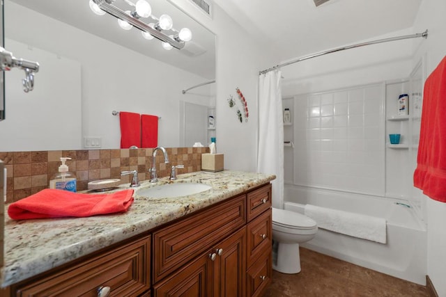 full bathroom featuring vanity, decorative backsplash, toilet, and shower / bath combo with shower curtain